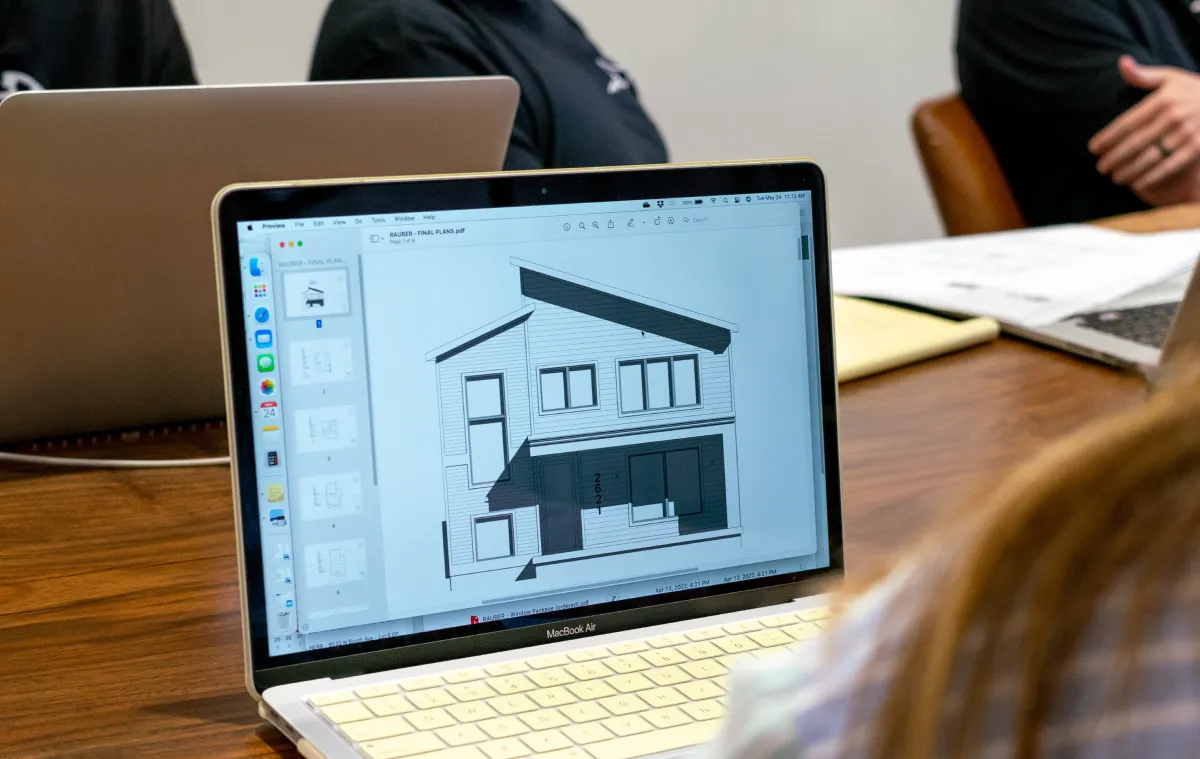 The plan for a home build on the screen of a laptop computer